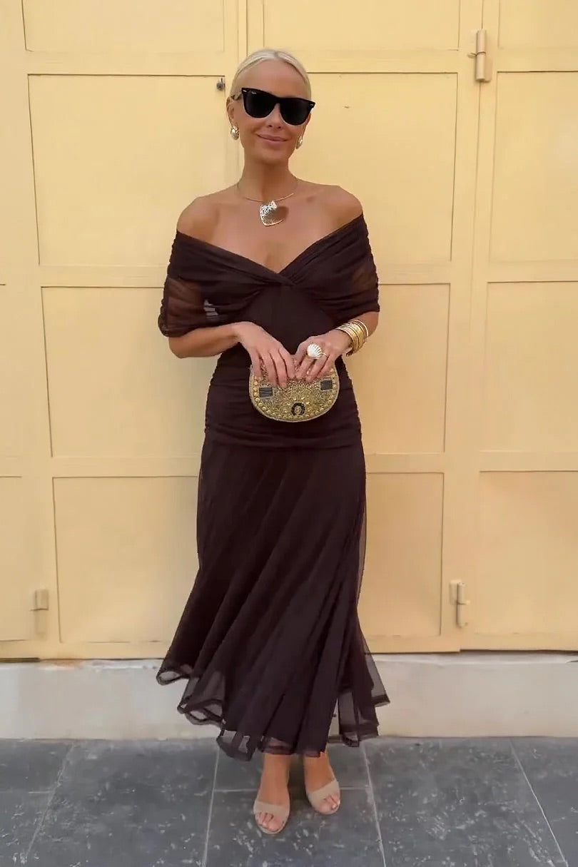 Stylish V-neck midi dress for women featuring delicate flutter sleeves and gathered details.