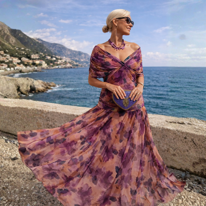 V-neck A-line midi dress for women, featuring gathered details and soft flutter sleeves.