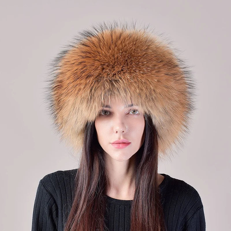 Women's genuine fox fur hat paired with a winter coat, demonstrating an elegant cold-weather look