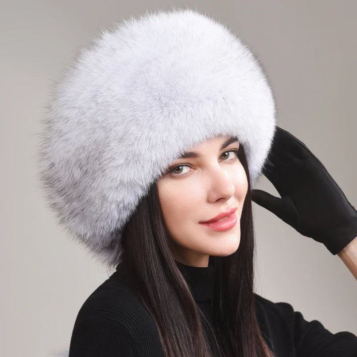 Close-up of a women's fox fur hat, showcasing the natural texture and quality of the luxury material