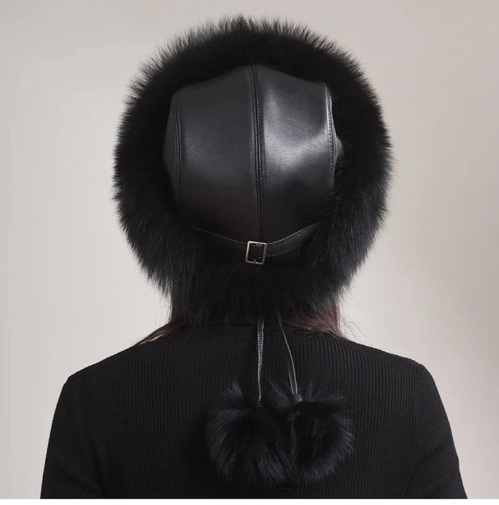 Luxury women's fox fur hat on a display stand, highlighting its elegant design and warmth