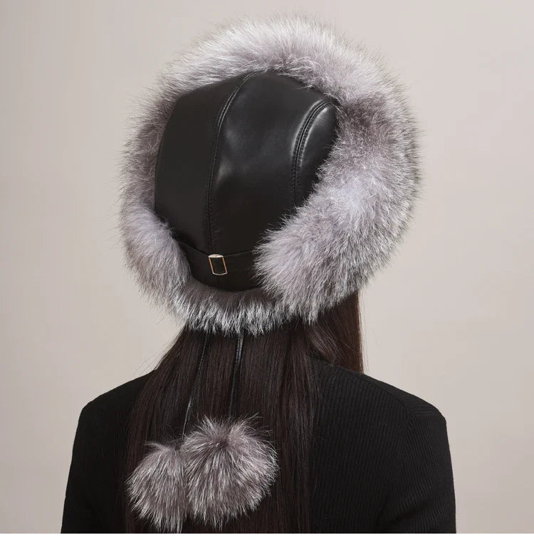 Detailed shot of the soft, genuine fox fur on a women's winter hat, emphasizing quality