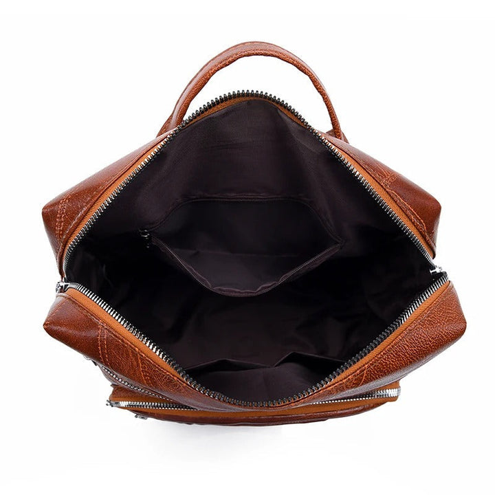 Fashionable genuine leather backpack for women, an elegant and spacious handbag alternative for travel & daily use.