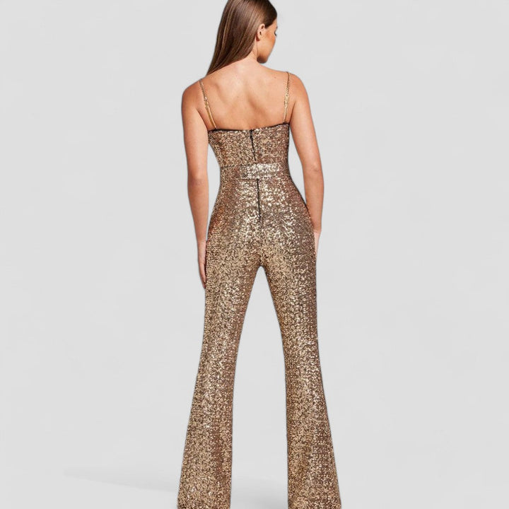 Shimmering gold sequin jumpsuit for women, featuring elegant flared legs. Ideal for glamorous evening parties.