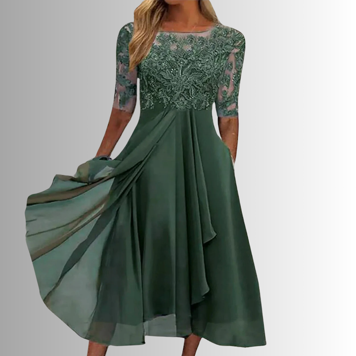Classic women's midi dress with half sleeves, round neck. Elegant A-line style, flattering fit for any party or event.
