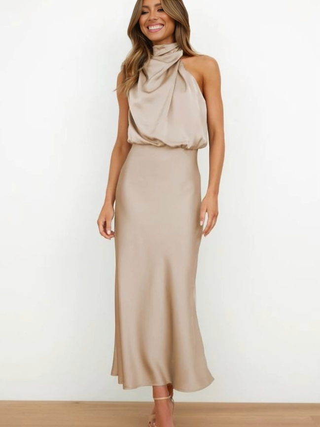 Floor-length women's formal dress, a sophisticated halter evening gown with an elegant open back.