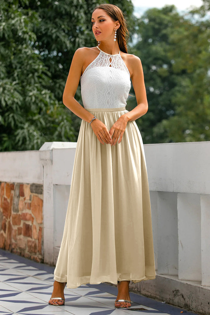 Detailed shot of the fabric texture on a women's halter neck evening wear maxi dress
