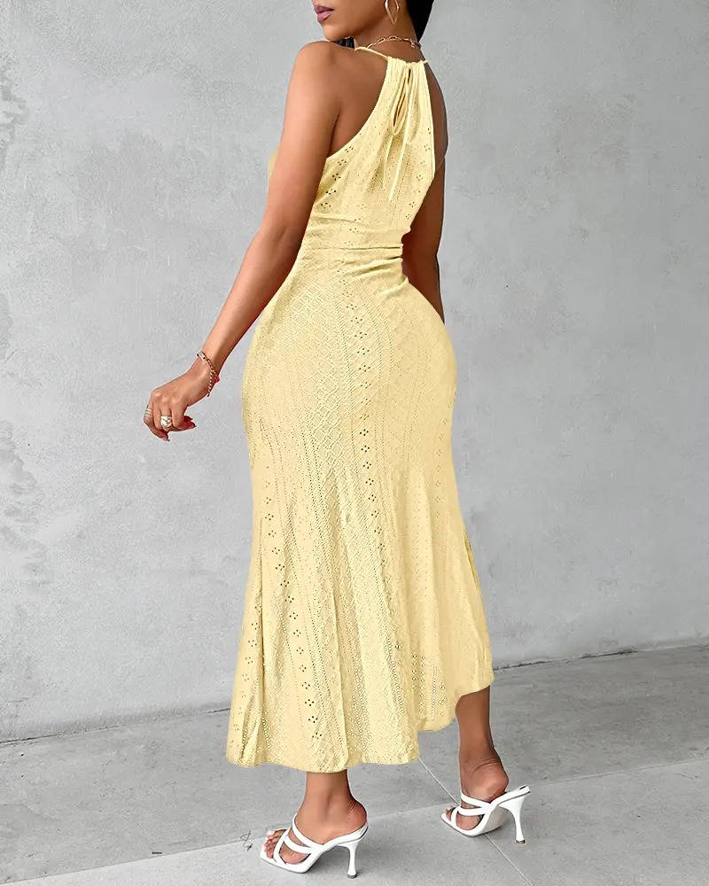 Trendy spring fashion halter neck maxi dress with an elegant slit, a must-have women's party dress.