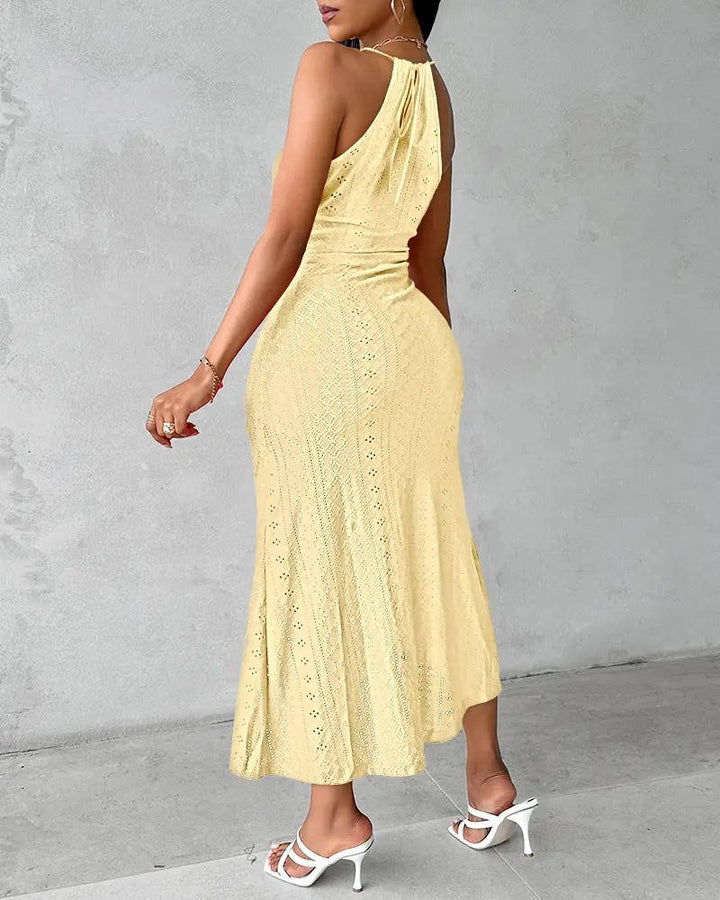 Trendy spring fashion halter neck maxi dress with an elegant slit, a must-have women's party dress.
