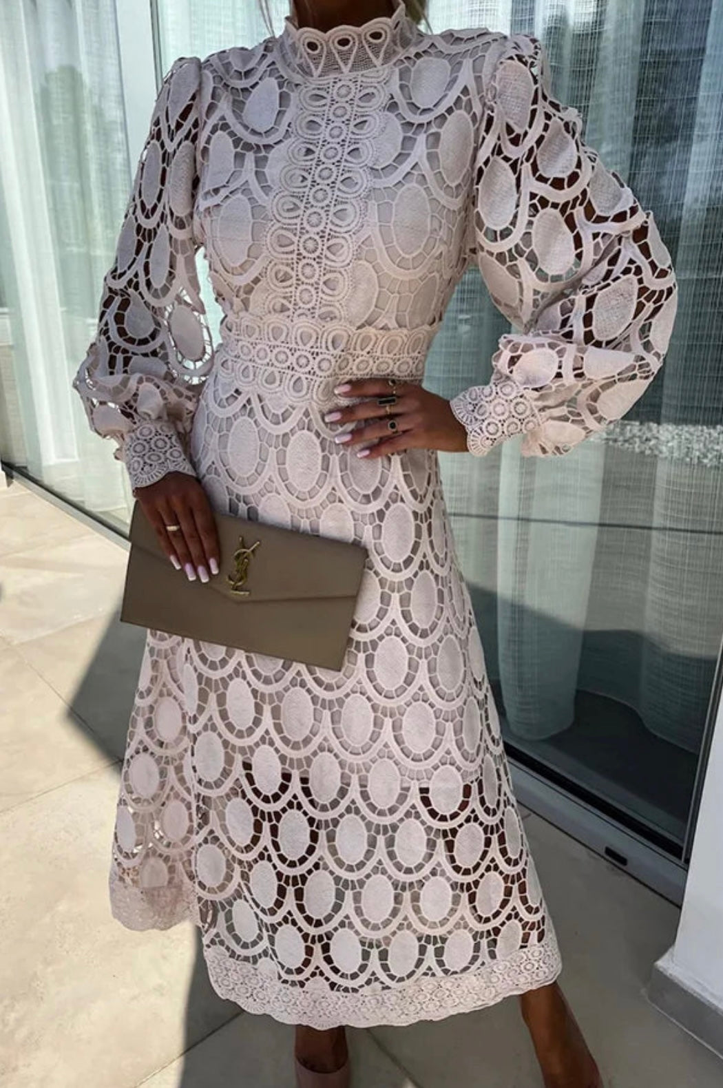 Sophisticated A-line midi dress for women, featuring a high neck and long sleeves, flattering for special occasions.