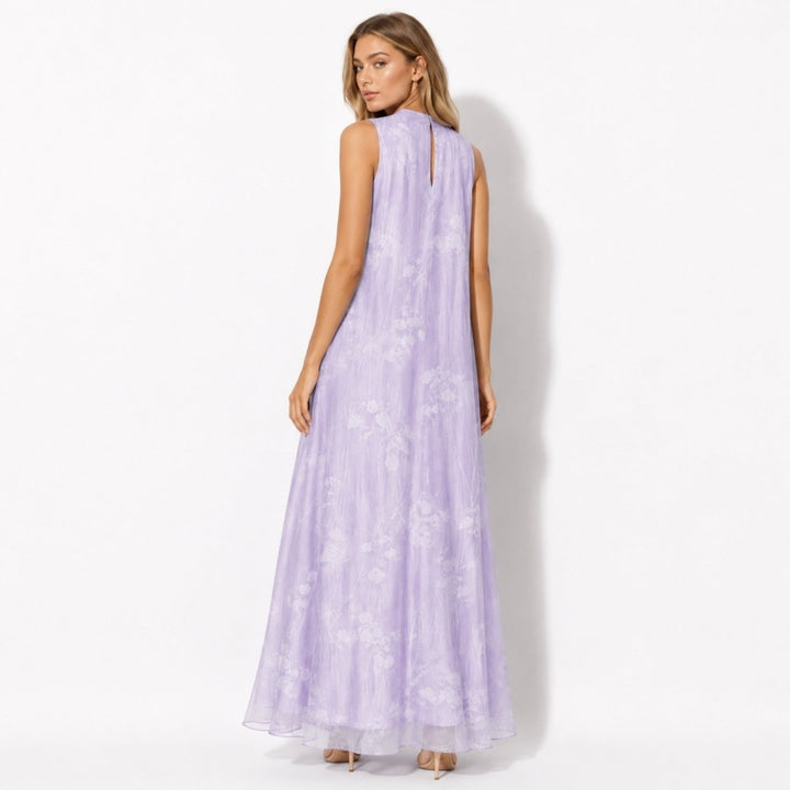 Beautiful women's floral maxi evening gown with high neck, ideal as a wedding guest or party dress.