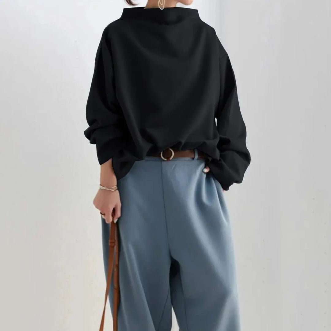 Sophisticated high-neck women's long-sleeve top. Effortless elegant style for any occasion.