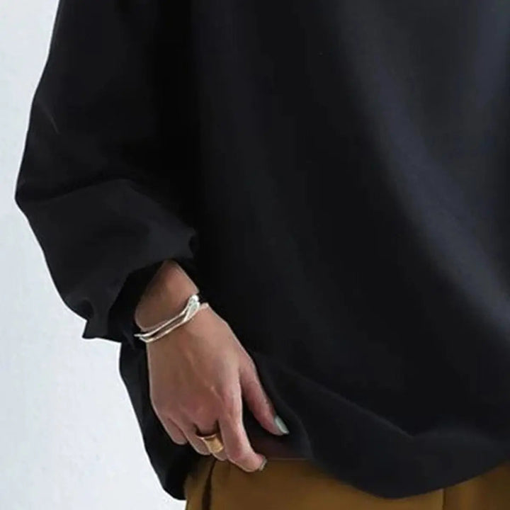 Versatile high-neck long-sleeve women's top. Classic elegant design available in multiple colors.