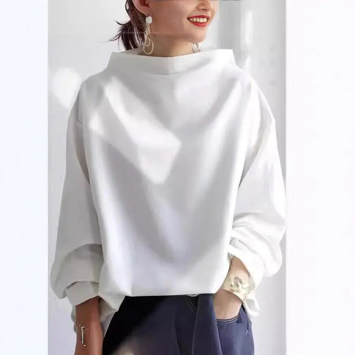Effortless high-neck long-sleeve women's top. Elegant and sophisticated, ideal for versatile styling.