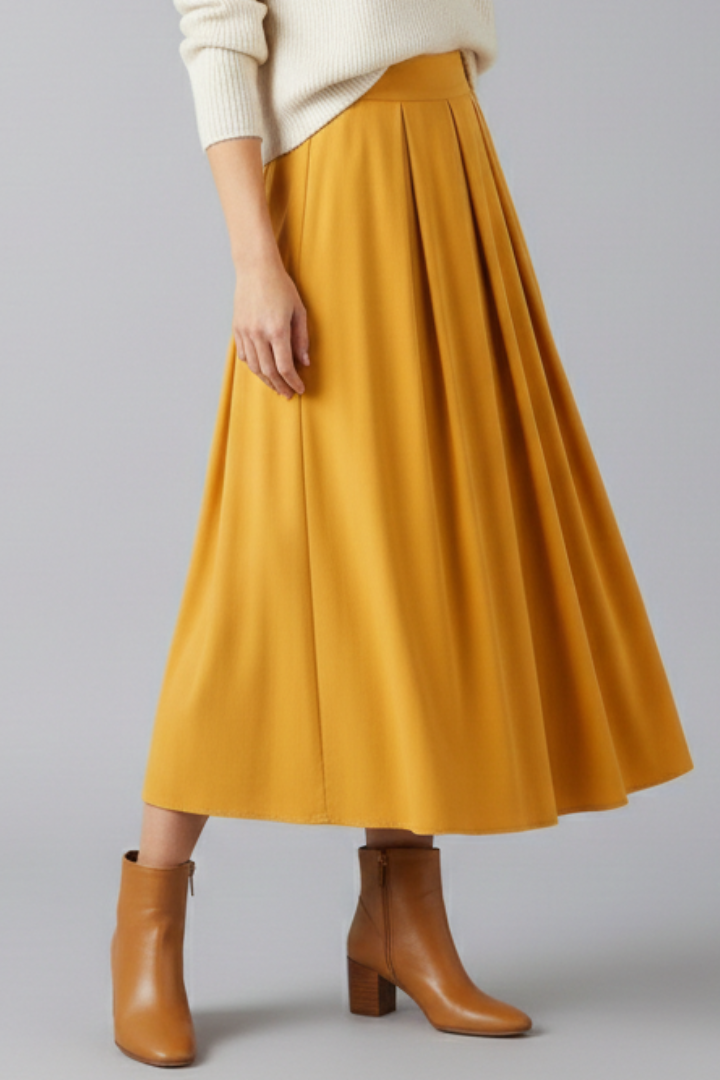 Modest women's elegant flowy pleated maxi skirt with a comfortable high waist.