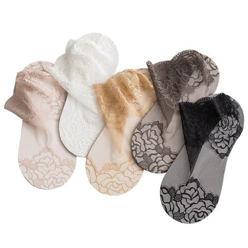Top-down view of six pairs of women's fashion lace mesh ankle socks, cotton blend material.