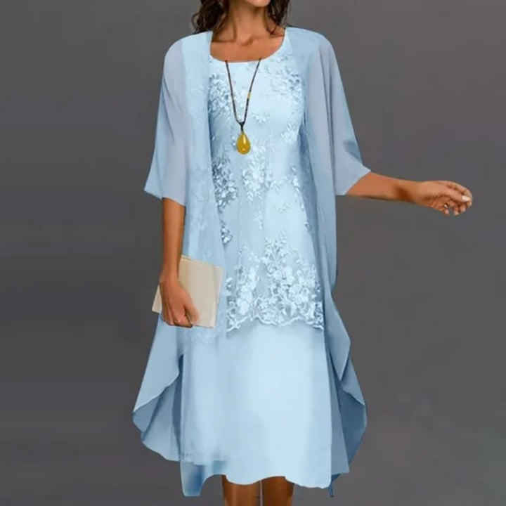 Stylish two-piece midi dress for women featuring delicate lace overlay, ideal for special occasions