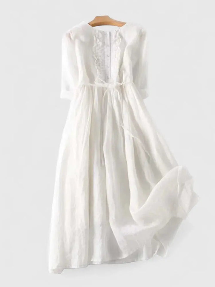 Chic women's midi dress with elegant lace-up detail. A comfortable and versatile option for spring & summer.