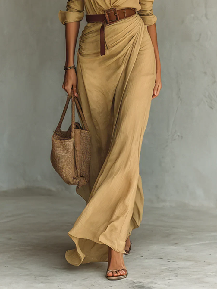 Flattering women's elegant belted maxi dress with lapel & long sleeves, creating a sophisticated silhouette.