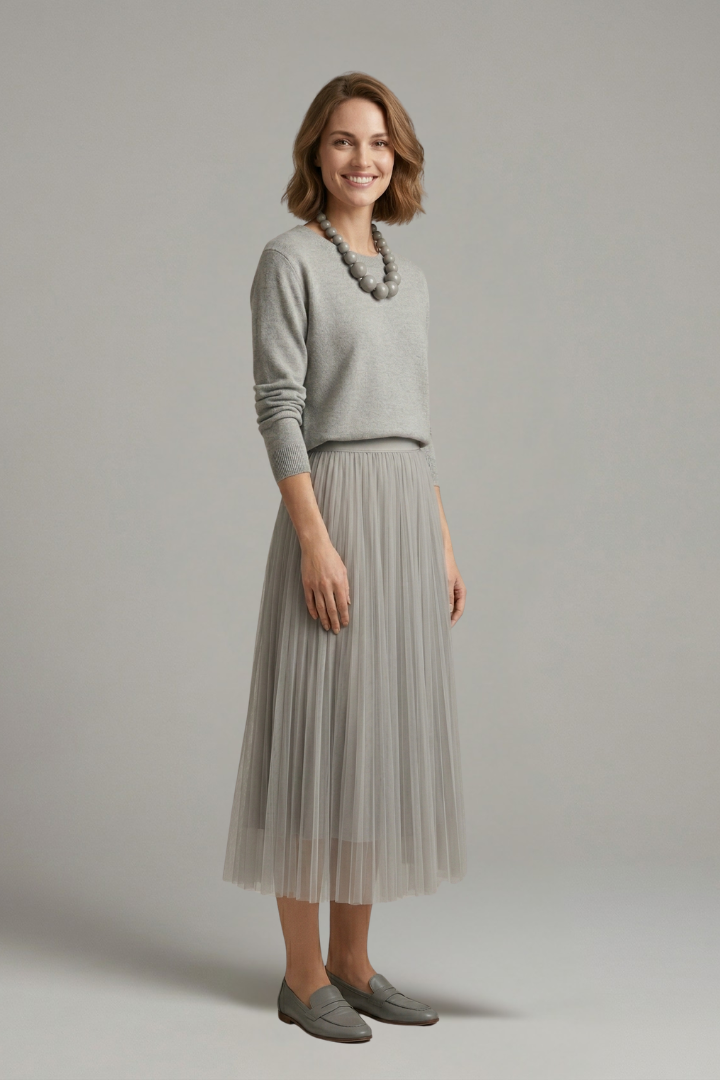 Chic women's elegant layered midi dress with a graceful pleated skirt, ideal for parties, work, or casual outings.