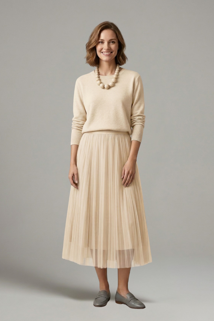 Flattering women's layered dress with an elegant round neck & beautifully pleated midi skirt for chic, versatile style.