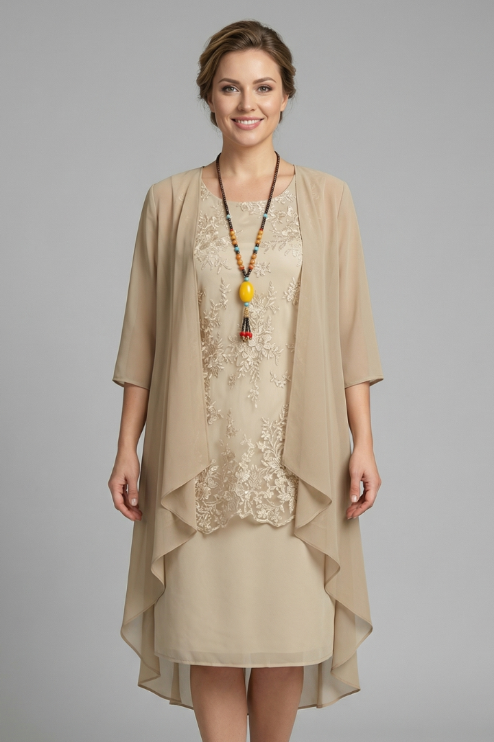 Chic women's layered dress featuring a sheer overlay for an elegant look. Ideal for spring/summer casual events.