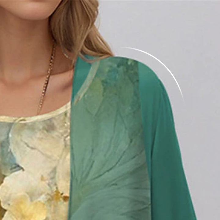 Stylish women's two-piece midi dress & open front duster. Flowy design, ideal for spring/summer.