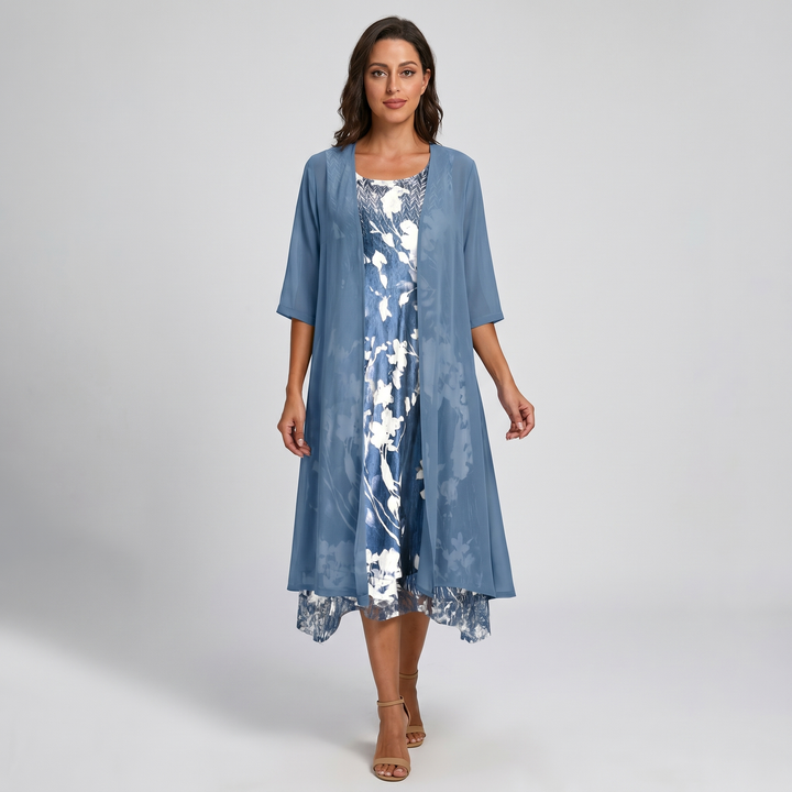 Flowy floral print two-piece midi dress set with open front duster for women. Spring/summer style.