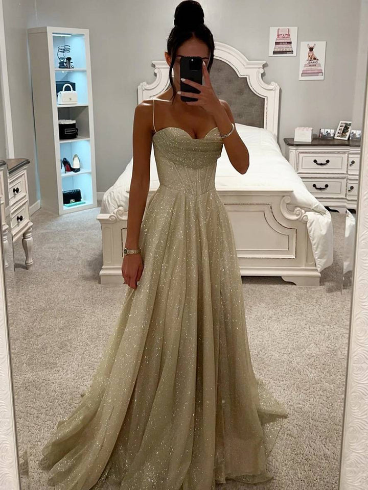 Stunning light pink long sleeve maxi dress for women, elegant design with a sophisticated open back.