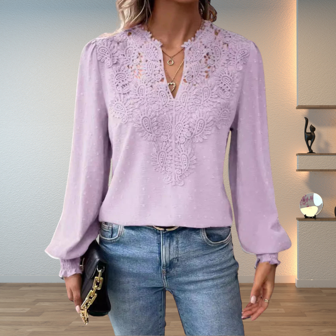 Fashionable women's elegant lace blouse, v-neck, and long sleeves; a lightweight and romantic top.