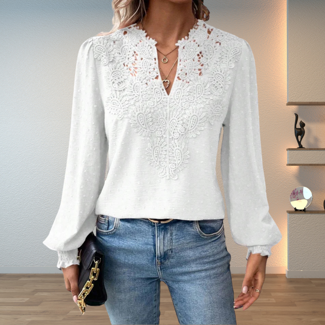 Romantic women's v-neck blouse with elegant lace details and long sleeves, a stylish and comfortable top.