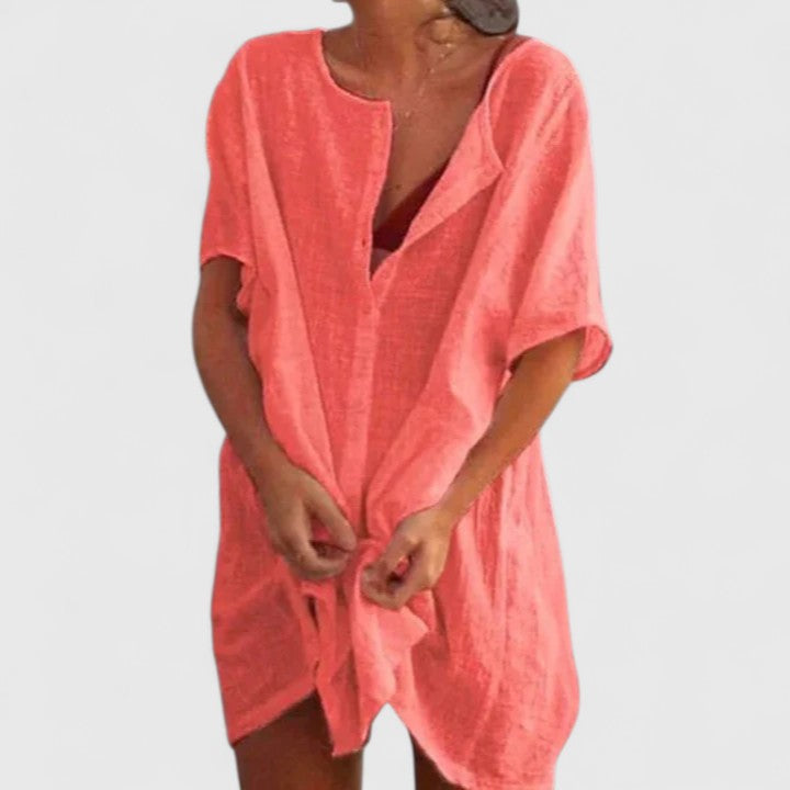 Back view of a relaxed fit women's tunic dress, perfect for comfortable summer fashion.