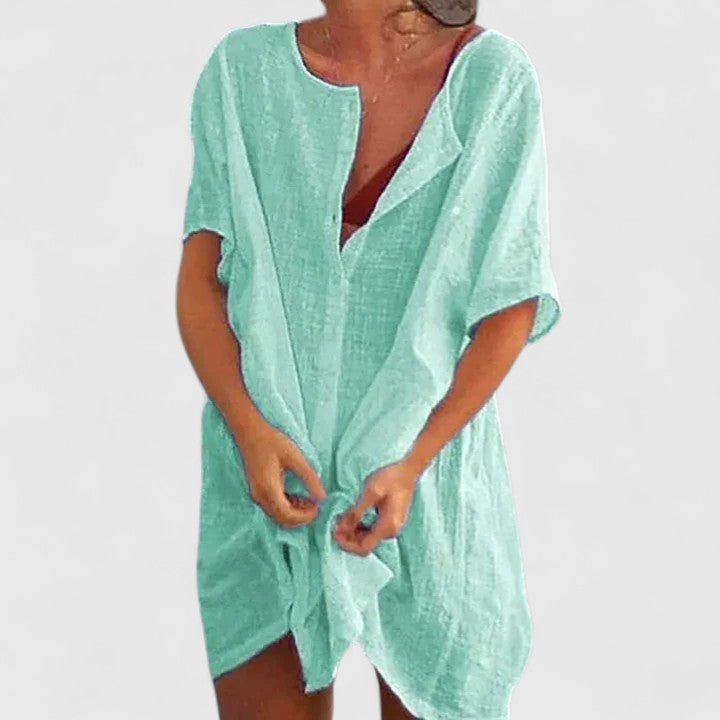 Comfortable relaxed fit women's tunic dress, essential for warm weather and beach vacation elegance.