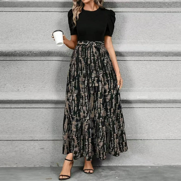 Chic printed women's long maxi dress, elegant and comfortable for a stylish summer look.