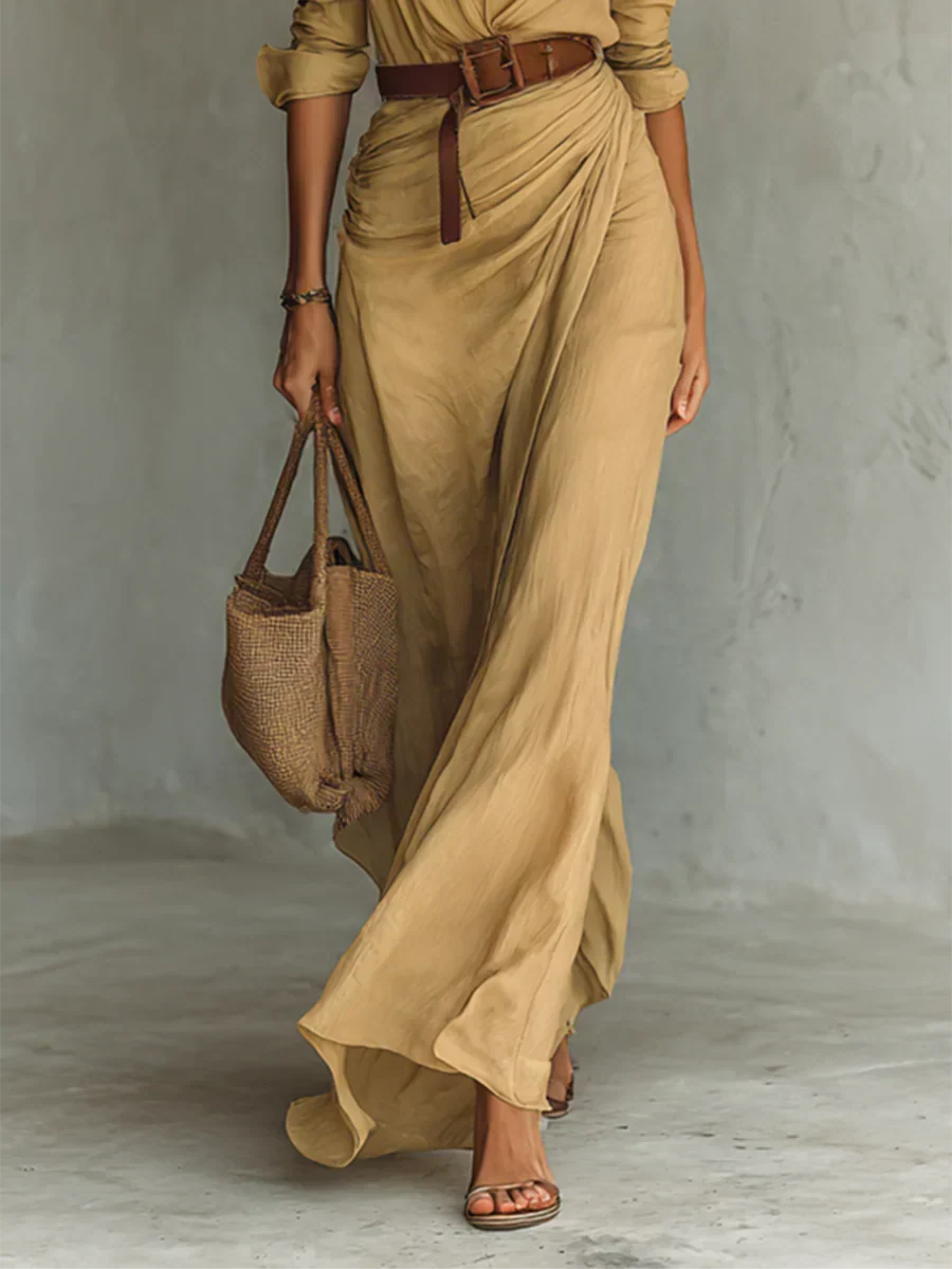 Sophisticated long sleeve maxi dress for women, featuring a flattering wrap style and belt. Great for cooler weather.