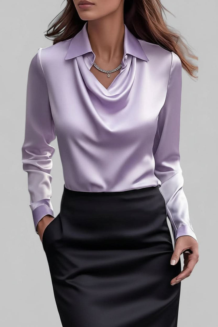 Women's elegant long sleeve blouse featuring a stylish draped front, suitable for any occasion.