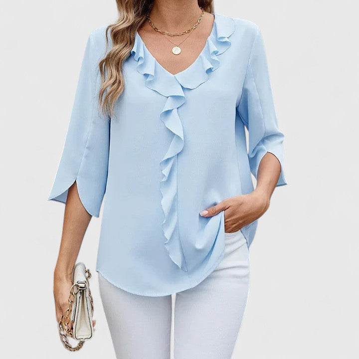 Elegant women's long-sleeve button-down blouse. Versatile chic top for ladies' fashion, work, or casual wear.
