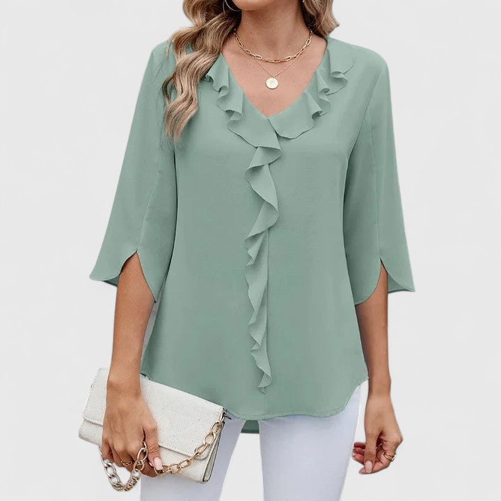 Effortlessly chic women's blouse. Elegant long-sleeve top for versatile style in ladies' fashion.