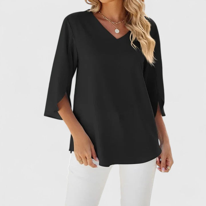Stylish women's button-down blouse. Elegant long-sleeve top, perfect for versatile ladies' fashion.