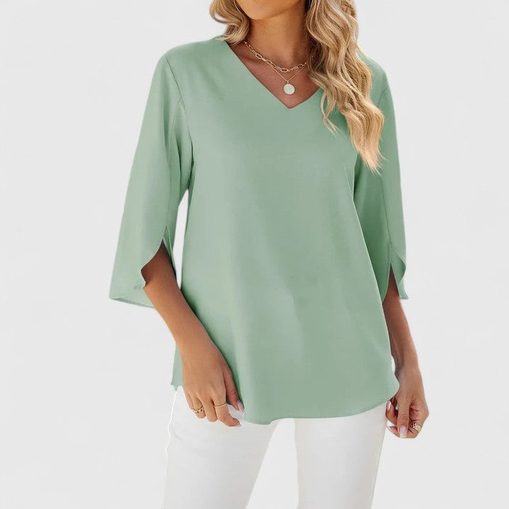 Refined elegant women's blouse. Versatile long-sleeve top, perfect for chic workwear & casual style.