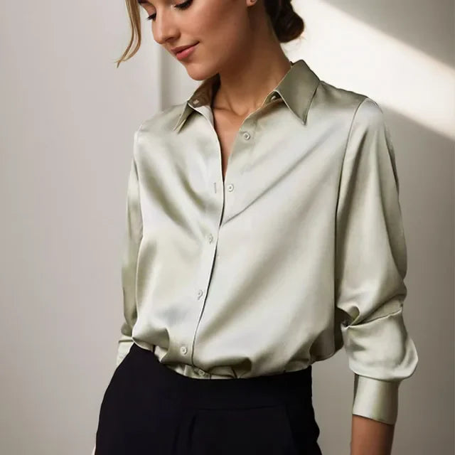 Elegant women's long sleeve button-down satin blouse, perfect for formal workwear or casual chic outfits.