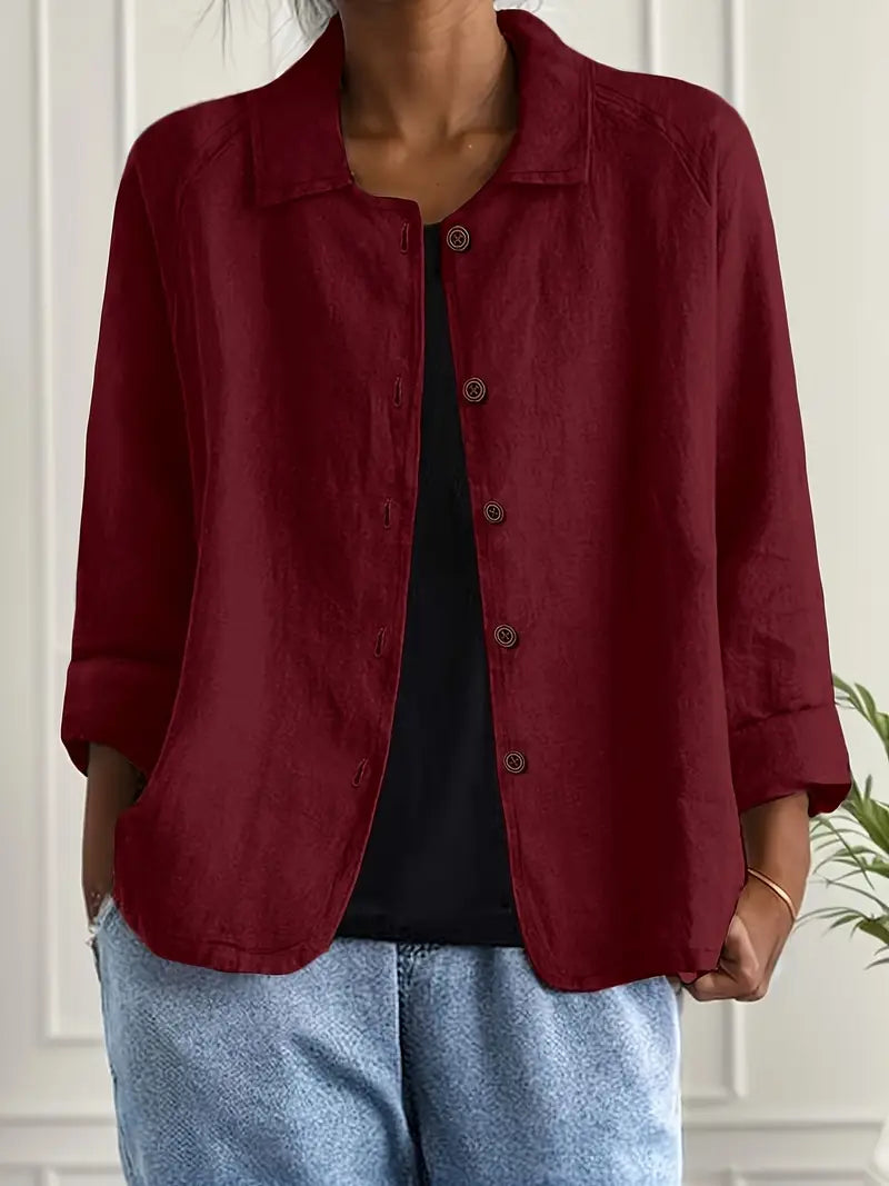 Women's sophisticated long sleeve button-up blouse. Elegant design with a relaxed fit, a stylish and comfortable top.