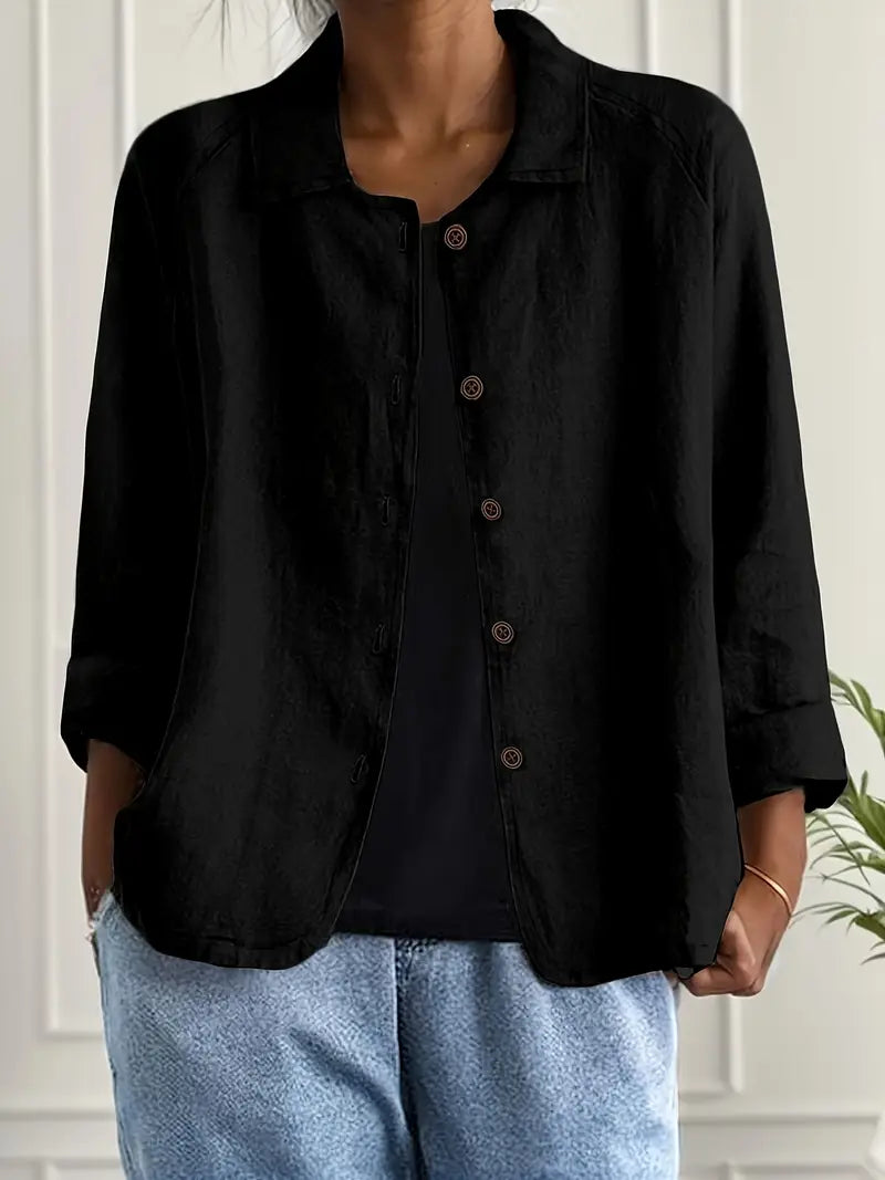 Stylish women's long sleeve button-up blouse. Elegant and sophisticated fashion top, great for work or casual looks.