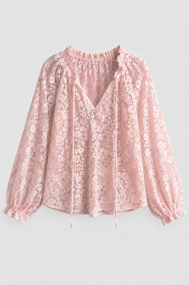 Elegant women's long sleeve lace blouse with tied neckline. Versatile top for casual or dressy occasions.