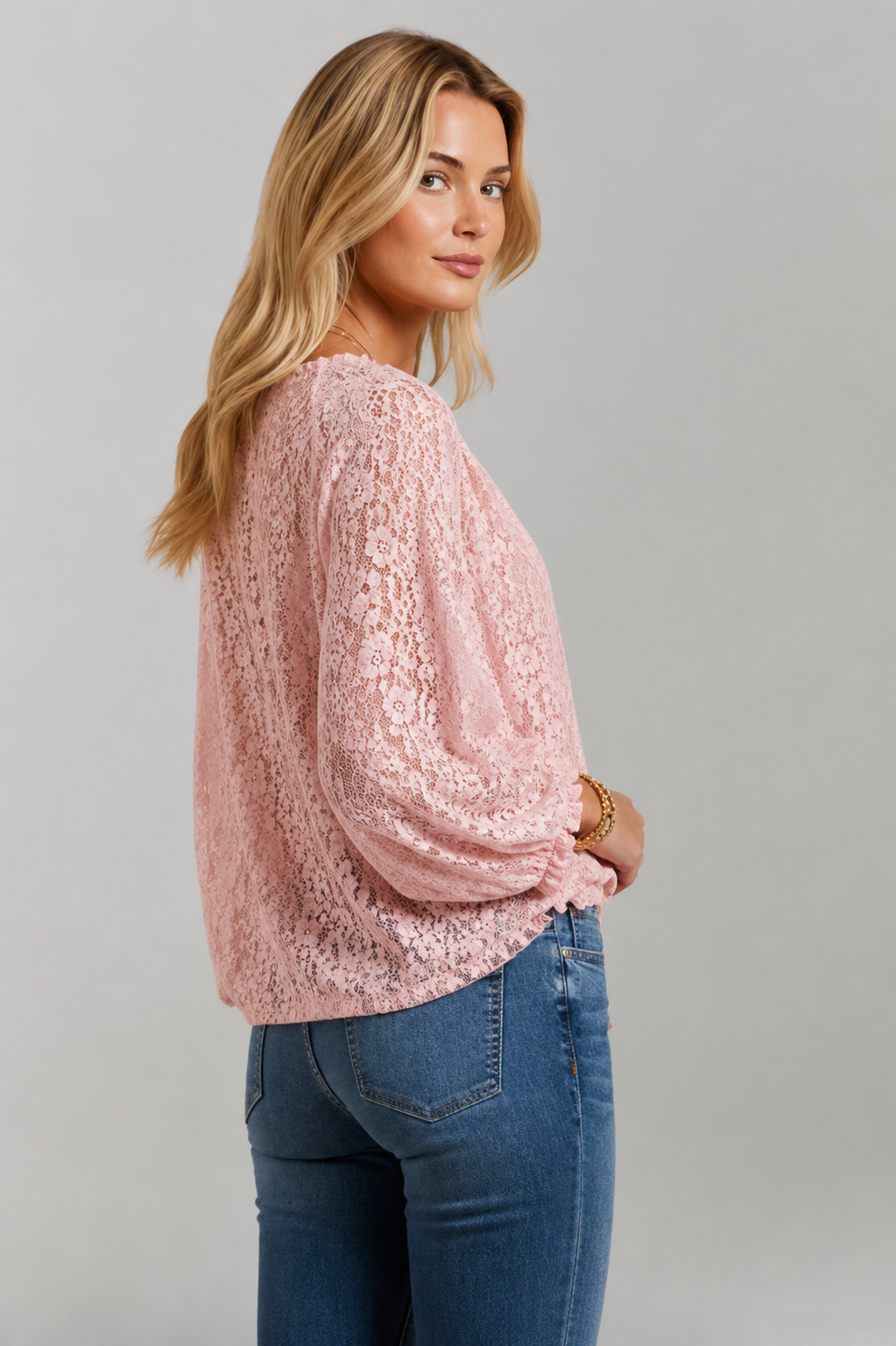 Versatile women's long sleeve top with elegant lace details & a tied neckline, suitable for any event.