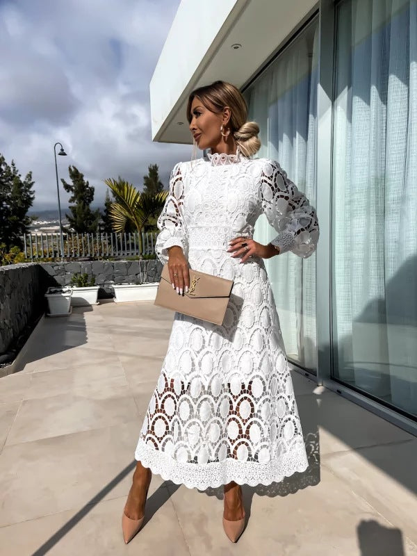 Chic long sleeve lace pattern midi dress for women, ideal for wedding guests, cocktail parties & special occasions.