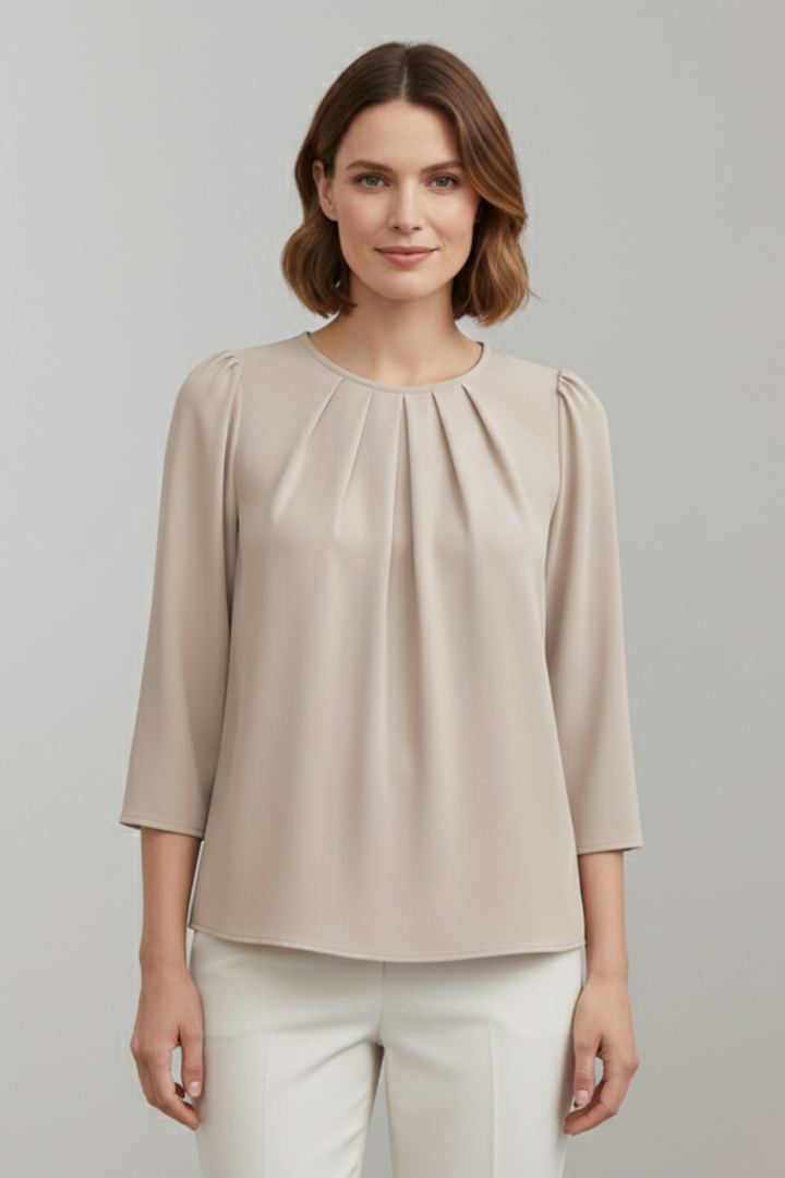 Stylish women's pleated long sleeve blouse, a versatile top for elegant office wear or casual fashion.