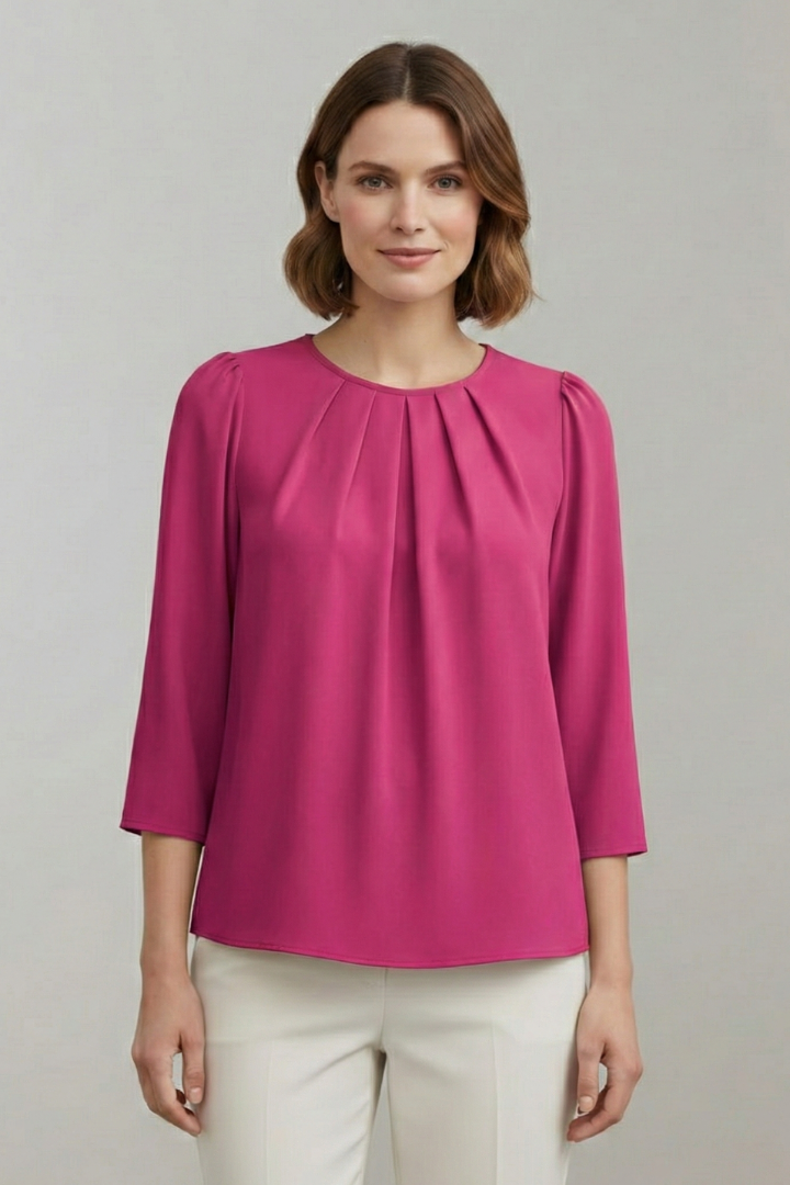 Fashionable women's long sleeve blouse with pleated front. Elegant, comfortable & versatile for any occasion.