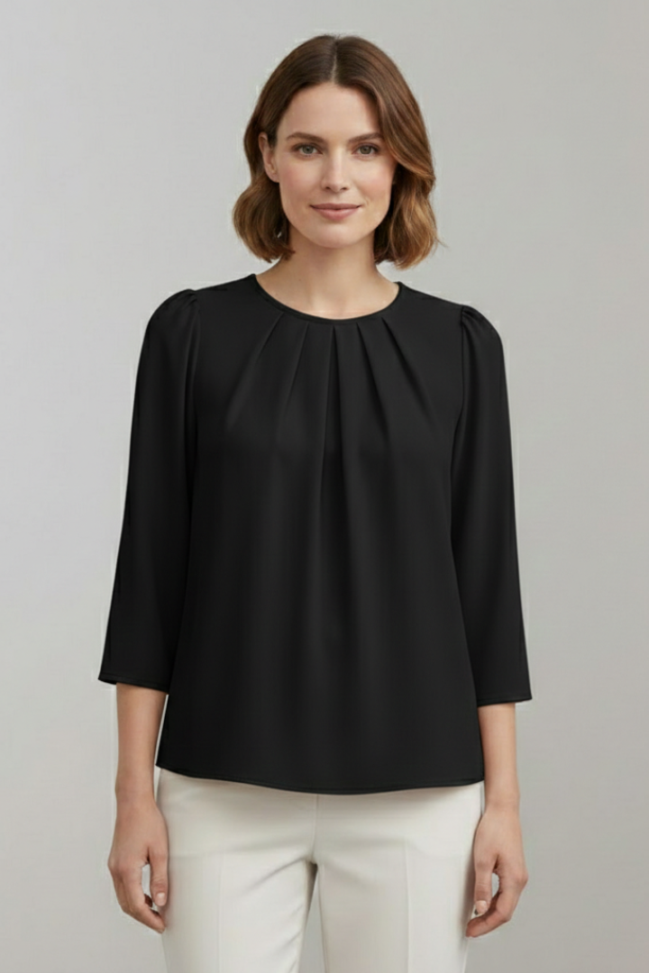 Elegant women's long sleeve blouse with pleated front. Versatile office wear or stylish casual top.
