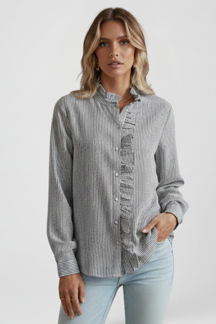 Women's long sleeve ruffle button-front blouse, a stylish and comfortable fashion top for any occasion.